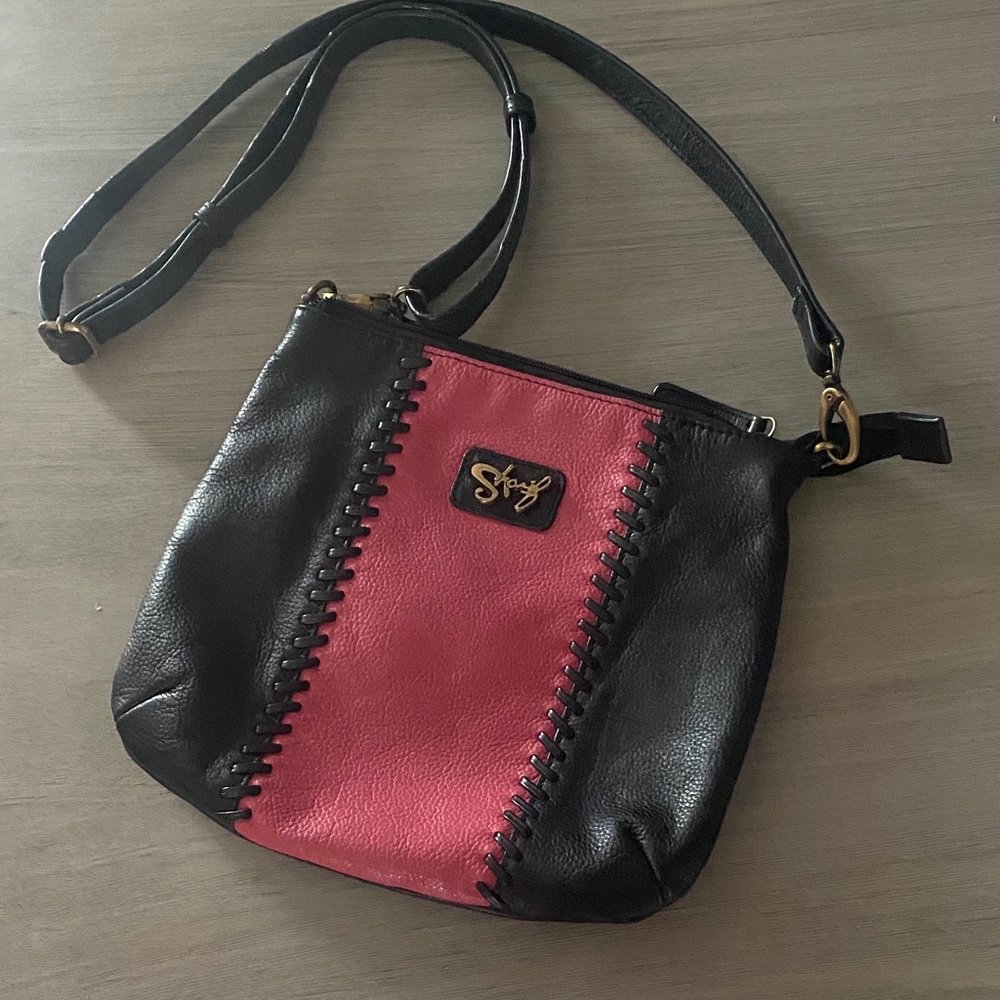 Sharif Pebbled Leather Black and Pink Crossbody Bag